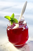 Raspberry jelly in a jar