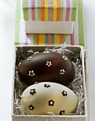 Filled Easter eggs in leavened quark dough with chocolate icing
