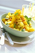Pumpkin and potato salad with cauliflower and red lentils
