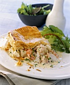 Fish and seafood pie with puff pastry