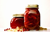 Cranberry compote in preserving jars