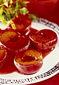 Baked peach halves with Grenadine syrup