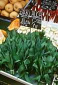Ramsons (wild garlic) with price label on market stall