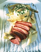 Duck breast with white asparagus and asparagus flan