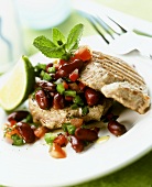 Grilled tuna steak with kidney bean and tomato salad