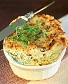 Mini-lasagne with soft cheese with herbs and nuts in dish