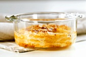 Potato gratin in a glass dish