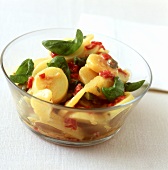 Potato salad with dried tomatoes, capers and basil