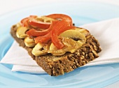 Slice of wholemeal toast with mushrooms and peppers