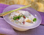 Thai fish soup with coconut milk and chili