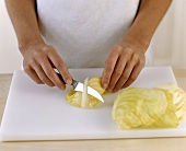 Preparing white cabbage leaves (cutting the ribs flat)