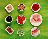 Ingredients for pasta dishes: tomato puree, ham, peas etc.