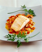 Salmon in tomato and coconut sauce