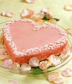 Pink heart-shaped cake with rose sugar