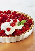 Raspberry tart with cream