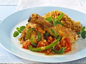 Basque chicken with vegetables and rice with peppers