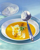 Carrot soup with ginger and sour cream