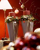 Christmas flower arrangement with one candle