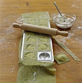 Home-made herb ravioli in a ravioli mould