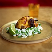 Roast quail on rice with parsley