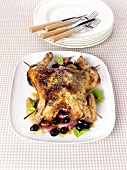 Stuffed chicken with garlic and black olives