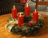 Advent wreath with four burning candles