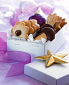 Various shaped marzipan biscuits in cardboard gift box