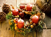 Rustic Advent wreath with burning candles