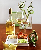 Still life with Asian food (shrimps, leeks, rice) and wine