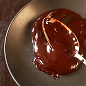 Chocolate blancmange with spoon