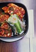 Korean kimchee with cucumber and cabbage (pickled)