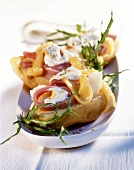 Potatoes filled with ham, sour cream and cheese