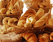 Still life with various types of bread in bread baskets