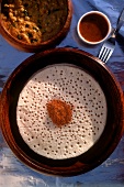 Appam (Fladenbrot aus Reis und Kokosflocken) Kerala, Indien