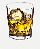Whisky in glass with ice cubes