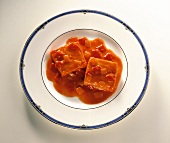 Bacallà amb samfaina (cod with tomato sauce, Spain)