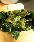 Green vegetable ravioli cooked in bamboo steamer