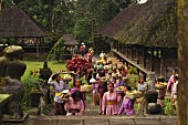 Women making offerings of food (Bali, Indonesia)