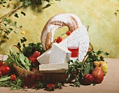 French Brie in a basket with bread