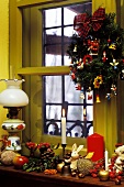 Window sill in a country house with Christmas decorations