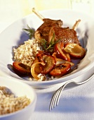 Lamb chops with rice and plums