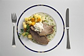 Boiled beef fillet with bouillon potatoes and apple horseradish