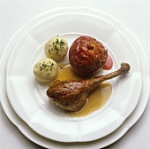 Roast goose with potato dumplings and baked apple