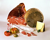 Still life with Serrano ham, cheese, salami and tomatoes