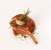 Lamb chop with clove of garlic and rosemary
