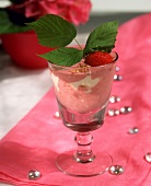 Sweet strawberry quark served in a glass