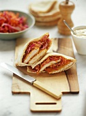 Pitta bread filled with chicken escalope and salad