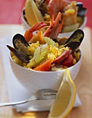 Paella served in white bowls
