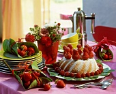 Ring cake with berries & strawberries parcels on coffee table