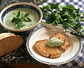 Bread and herb dip with corn salad